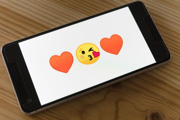 smart phone dating app, indoors on a wooden table